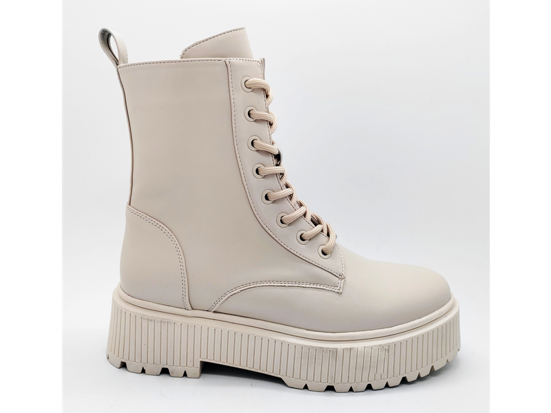 Bottes beiges au design avant-gardiste et à semelles hautes pour femmes